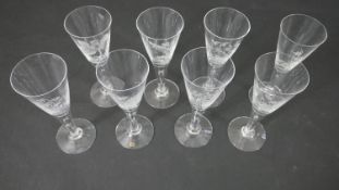 A set of eight Limited edition Royal Academy and Dartington crystal goblets, with images from the