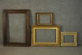 Four early 20th century picture frames, including three gilt wood and gesso frames, some with