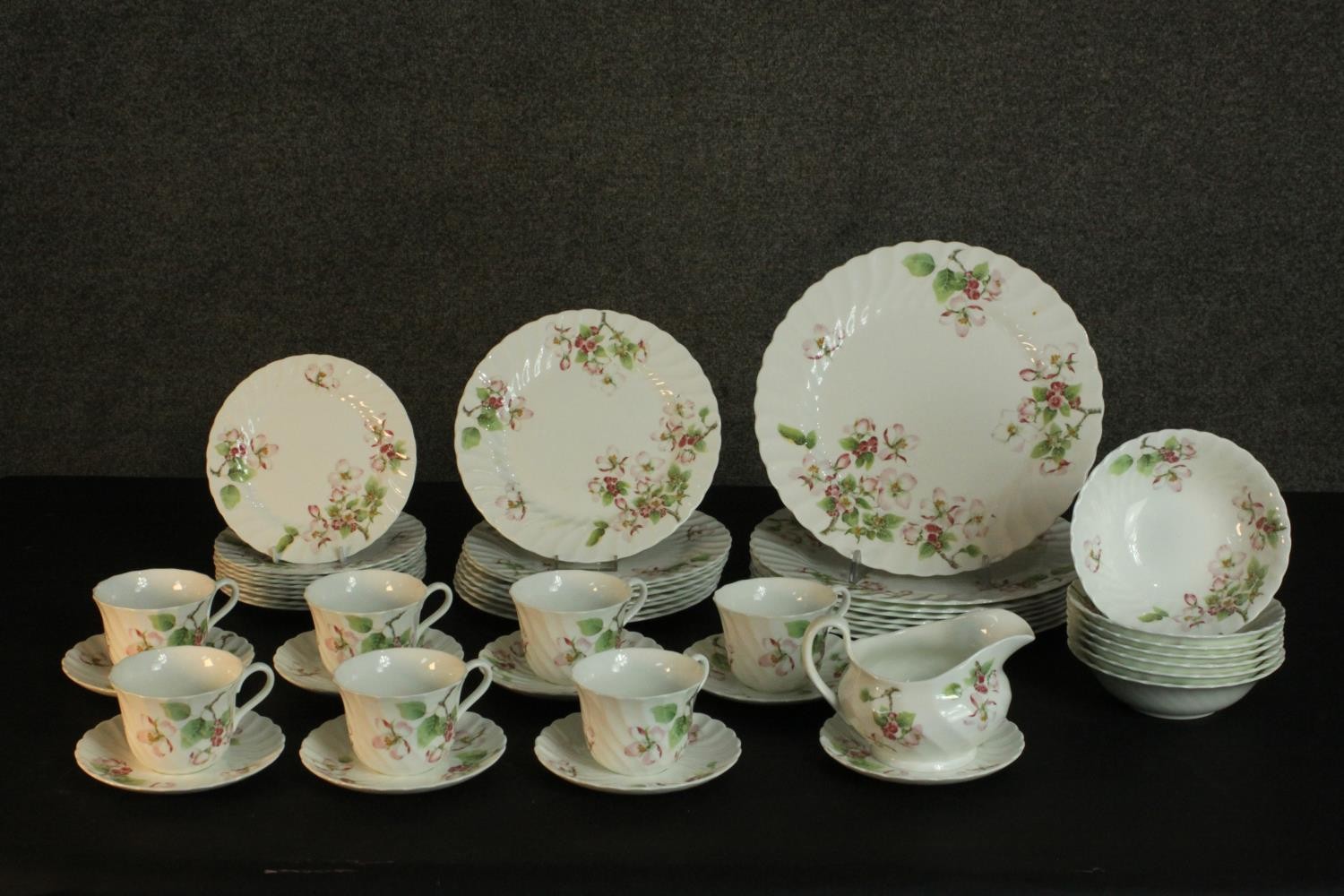 A 20th century Wedgwood Apple Blossom dinner and tea set (one cup missing) 47pieces. Largest piece