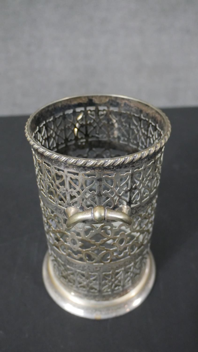 A pair of silver plated pierced design wine coasters and a similar twin handled bottle holder. H. - Image 5 of 7