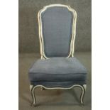A 19th century French white painted and parcel gilt side chair, upholstered in blue fabric, on