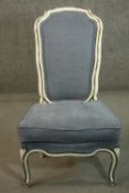 A 19th century French white painted and parcel gilt side chair, upholstered in blue fabric, on