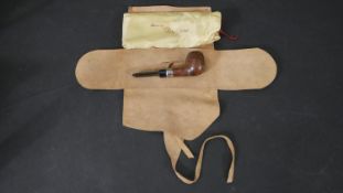 A Peterson's 1975 Centenary burr wood pipe, with a sterling silver collar, in original pouch.