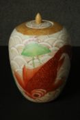 A 20th century Chinese hand painted ceramic ginger jar with koi carp and lotus design. H.30 Dia.