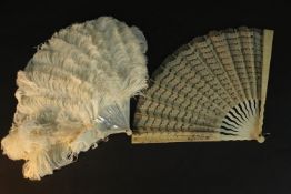 A white ostrich feather and mother of pearl ladies 19th century fan along with a lace and carved