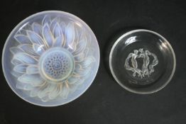 A Lalique circular glass dish, decorated with two Classical dancers, signed R. Lalique, France,