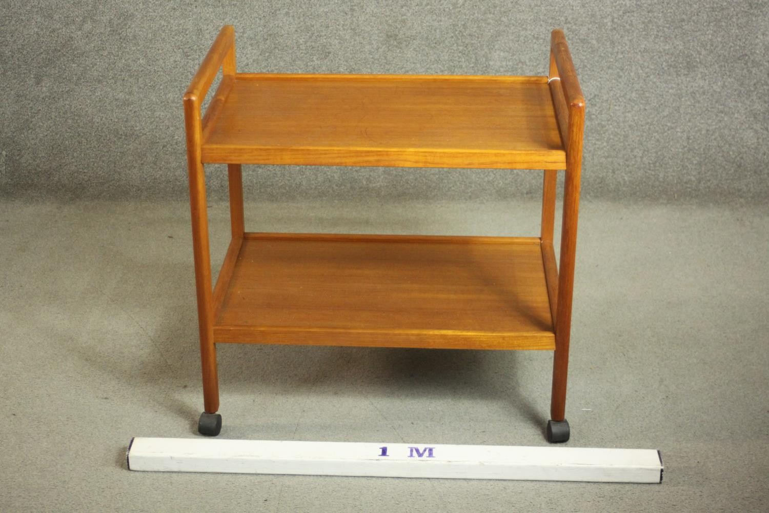 A circa 1970s Danish teak tea trolley, with two tiers, stamped 'Made in Denmark' to the underside. - Image 3 of 8
