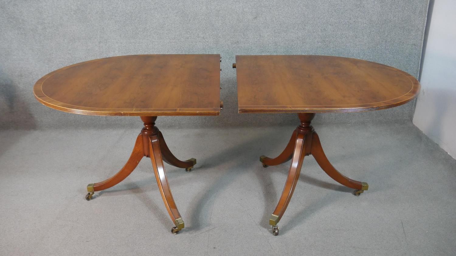A George III style yew wood D-end dining table, with a cross banded top and additional leaf, on - Image 3 of 9