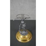 A Victorian Australian design brass an silver plated stand modelled in the figure of a cherub with a