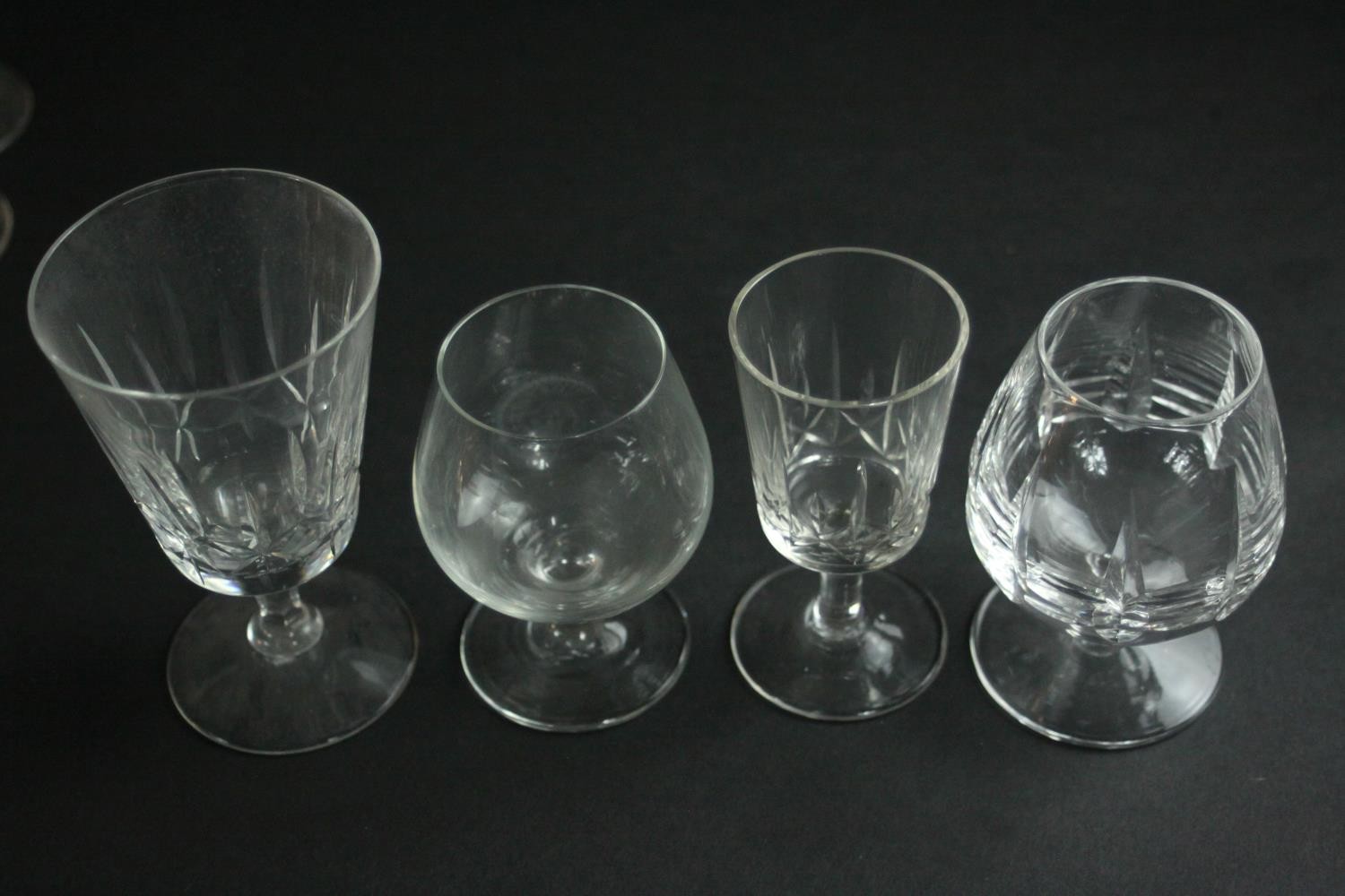 A collection of twenty alcohol glasses, including a set of six hand cut crystal brandy glasses, a - Image 3 of 3