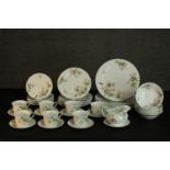 A 20th century Wedgwood Apple Blossom dinner and tea set (one cup missing) 47pieces. Largest piece