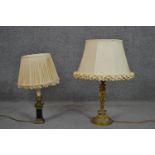 Two 19th century table lamps, one gilt metal with figural design and the other black marble