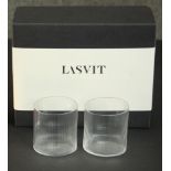 A boxed set of Lasvit 'Circle glass' tumblers with certificate. H.12 W.23 D.18cm (Largest)