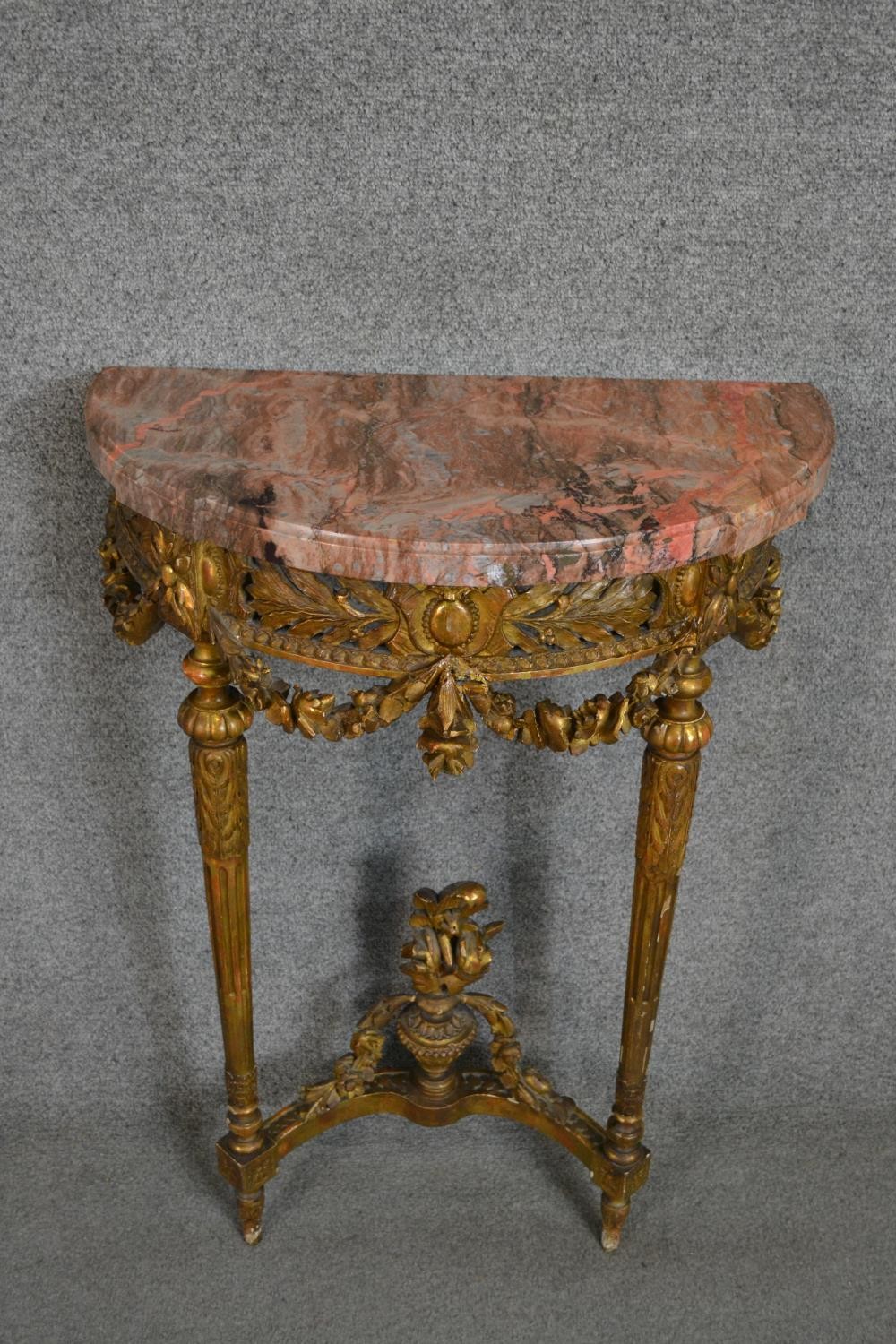 A carved gilt console table with demi lune pink marble top above fluted tapering supports and all - Image 3 of 7