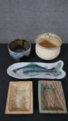 A collection of studio pottery including two foliate design rectangular dishes, signed to the