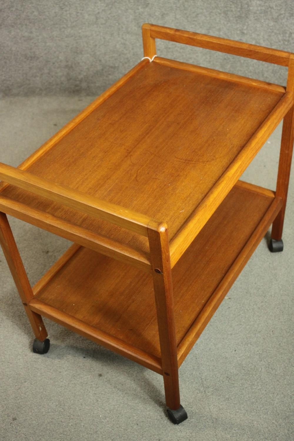 A circa 1970s Danish teak tea trolley, with two tiers, stamped 'Made in Denmark' to the underside. - Image 6 of 8