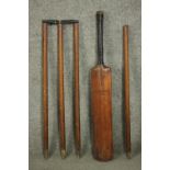 An early 20th century 'The Autograph', Harrow cricket bat along with four stumps and bails. H.