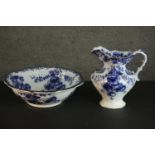 A Ford & Sons pottery 'Laurel' pattern china wash jug and basin, with blue transfer printed poppies.
