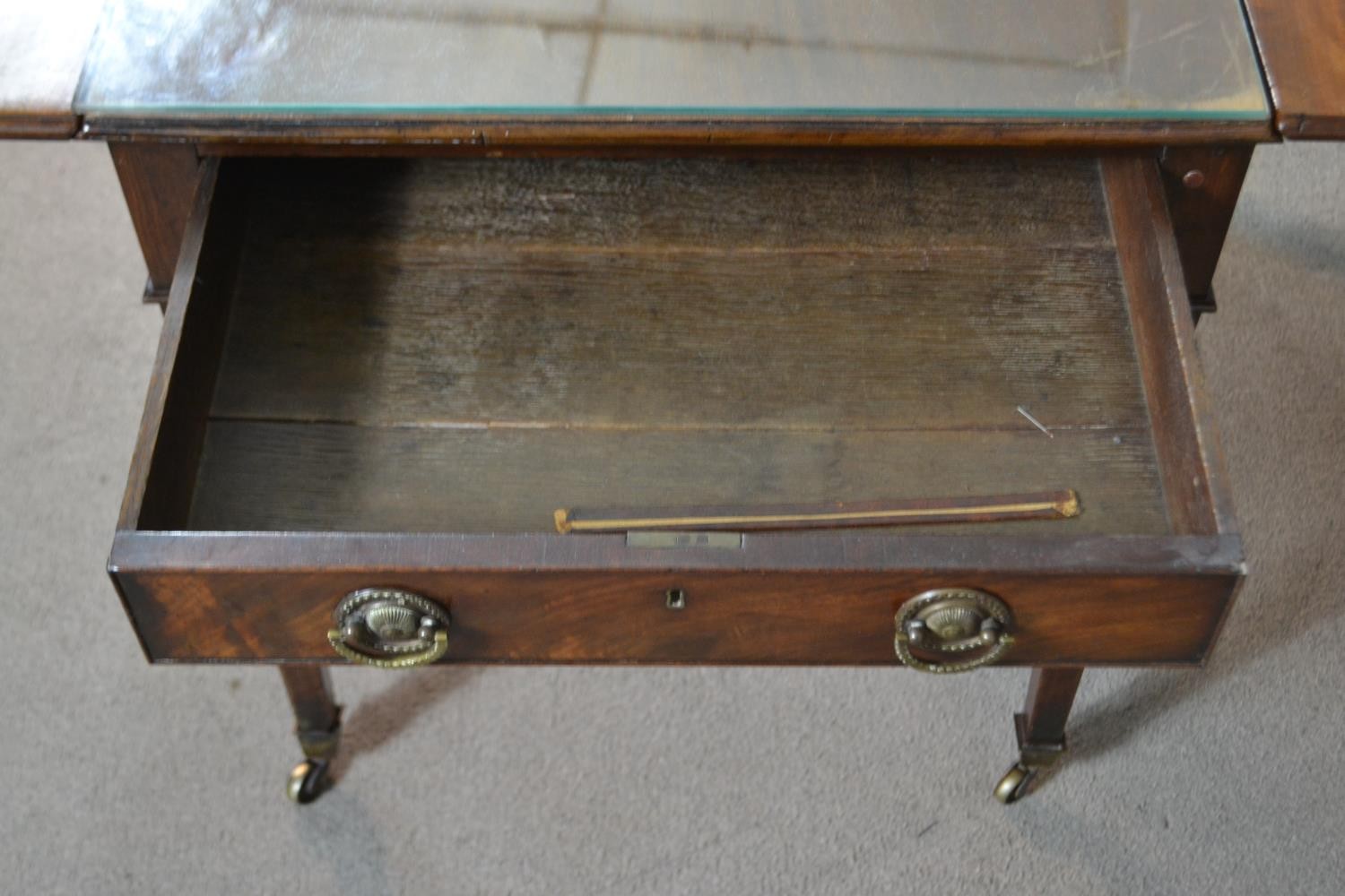 A 19th century mahogany Pembroke table, the top with drop leaves and a moulded edge, over two end - Image 6 of 6
