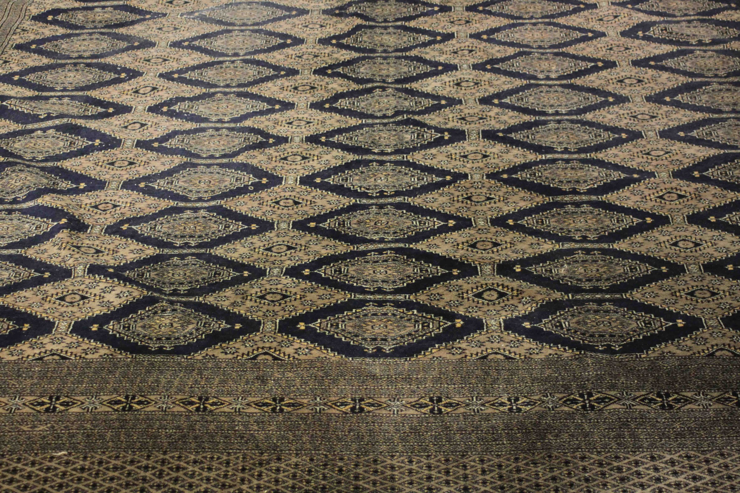 A hand made blue ground Bokhara carpet. L.460 W.310cm. - Image 7 of 7