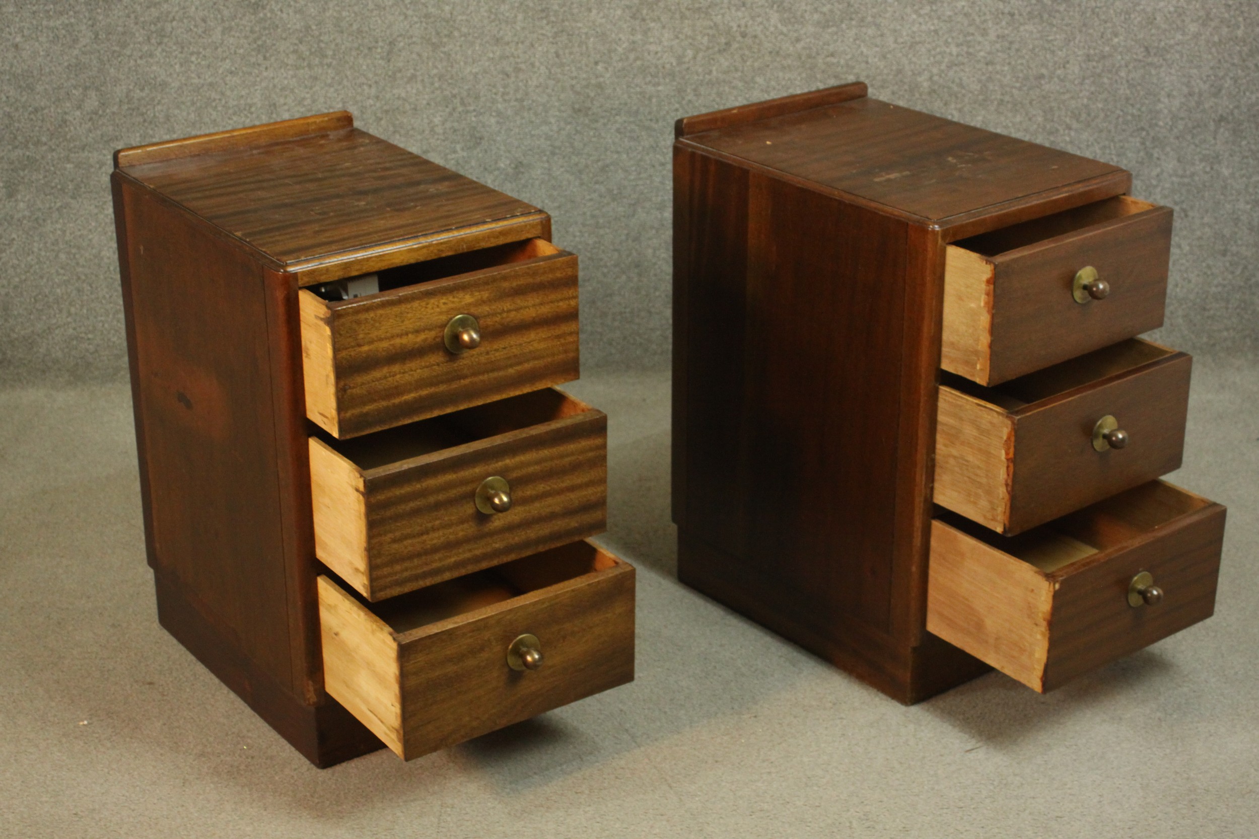 A pair of mid 20th century bedside chests, with a gallery back over three long drawers, on a - Image 3 of 6