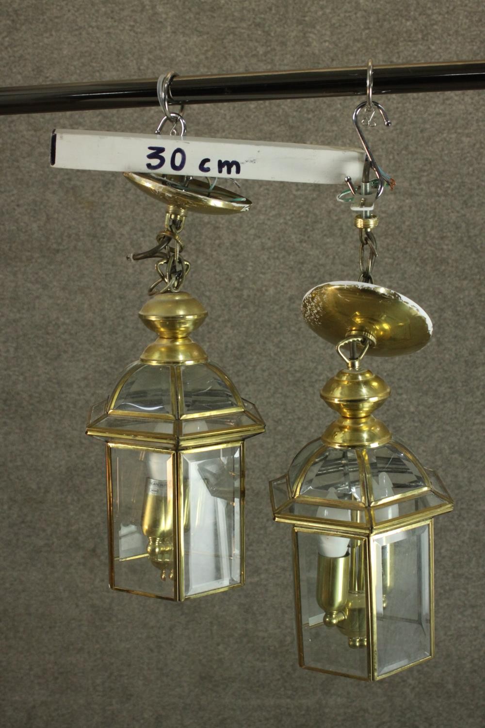 A pair of reproduction George III style brass hall lanterns, of hexagonal section, each with two - Image 3 of 8