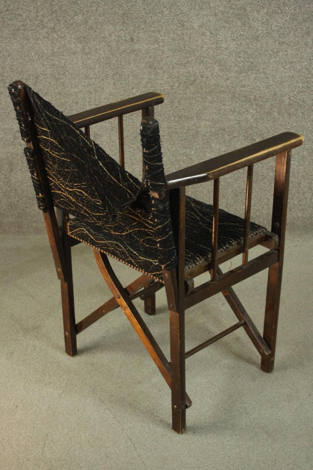 A 20th century 'Firma' folding campaign chair, upholstered in black fabric (damaged), made at the - Image 4 of 8