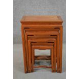 A quartetto nest of four Chinese hardwood tables, with rectangular tops, the legs joined by shaped