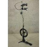A vintage dentist's drill converted into a standard lamp. H.140 W.130cm.