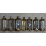 A set of seven brass and plate wall lanterns with angular design. (for candles) H.64 W.21cm