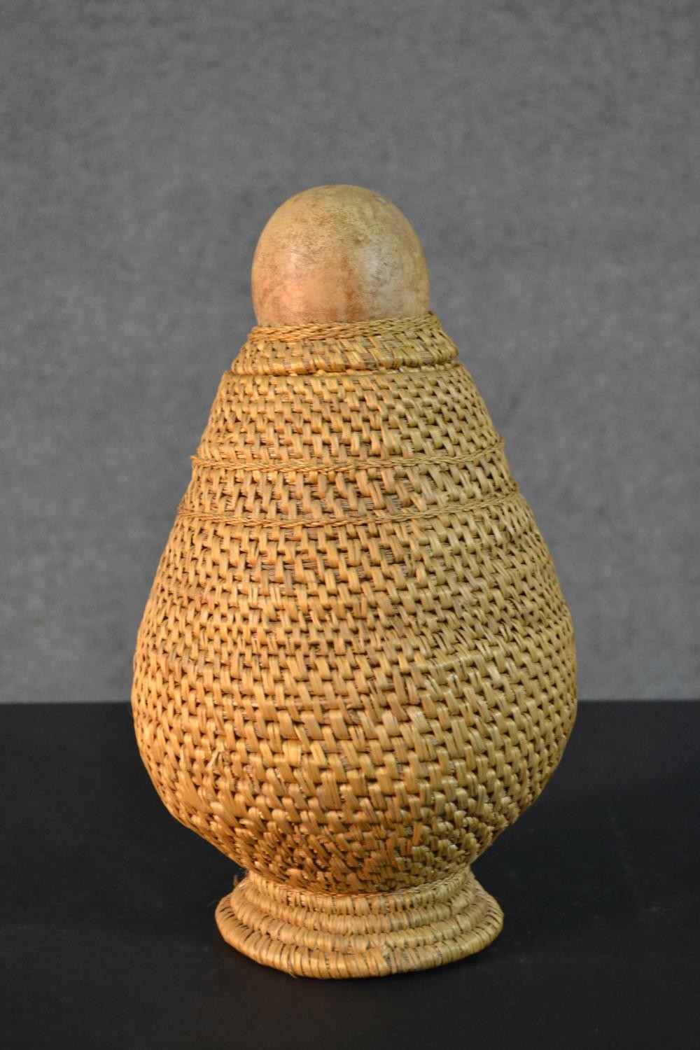 A woven African tribal vessel along with a smaller woven lidded pot. H.33cm (largest) - Image 2 of 6