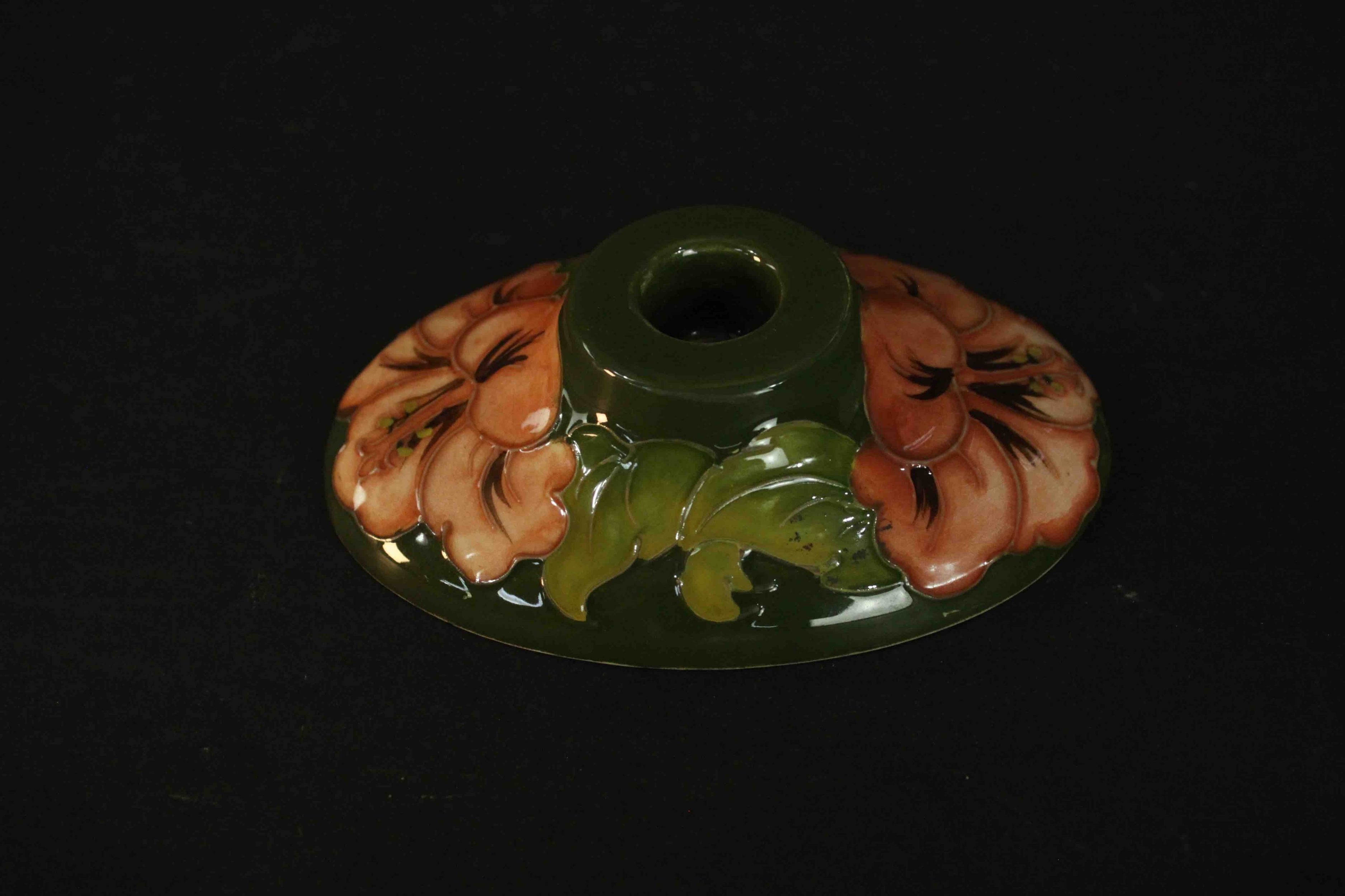 A Moorcroft hibiscus pattern candle holder with peach coloured flowers on a green ground, - Image 3 of 4