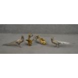 Four 1950's silver plated birds, including a pair of pheasants and two roosters with gilded details.