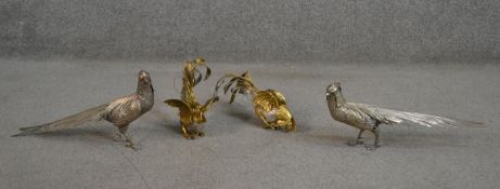 Four 1950's silver plated birds, including a pair of pheasants and two roosters with gilded details.