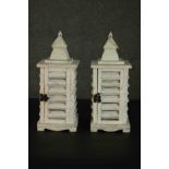 A pair of contemporary rustic white painted pine lanterns, with slatted sides. H.37 W.13 D.15cm.