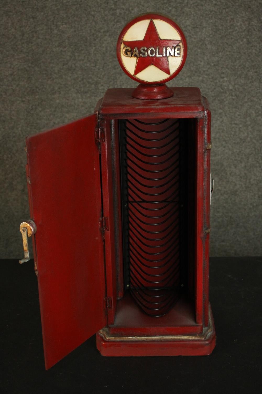 A red painted CD rack in the form of a vintage style American gasoline pump. H.66 W.22 D.19cm. - Image 4 of 10
