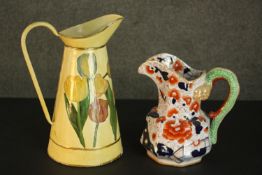 A Mason's style ironstone Imari pattern water jug together with an enamelled water jug decorated