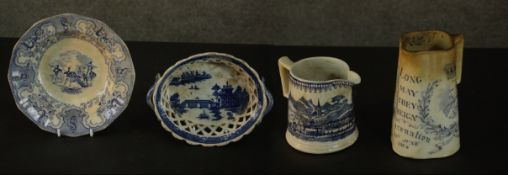 A collection of 19th century blue and white transferware, including two commemorative jugs, makers