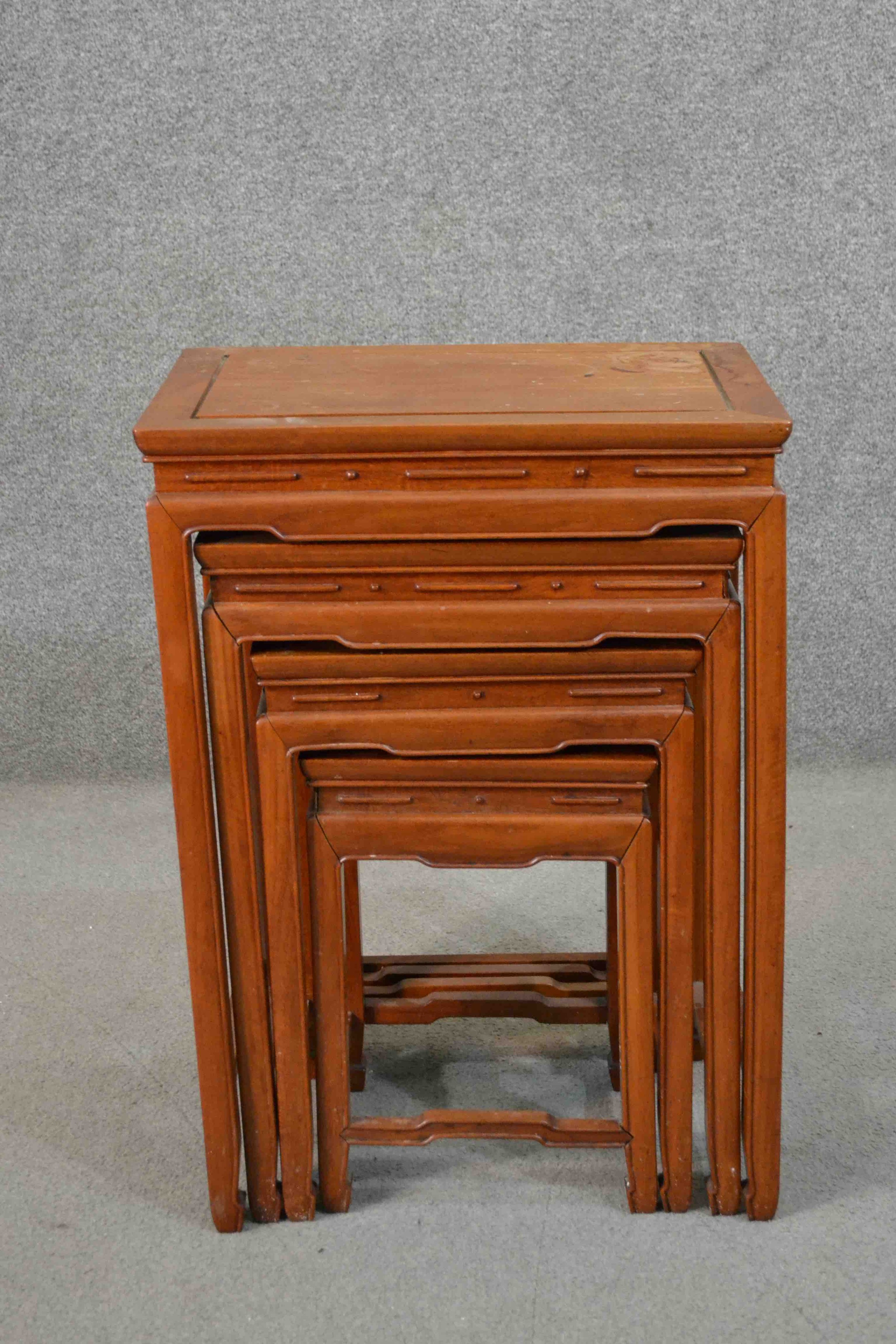 A quartetto nest of four Chinese hardwood tables, with rectangular tops, the legs joined by shaped - Image 2 of 6