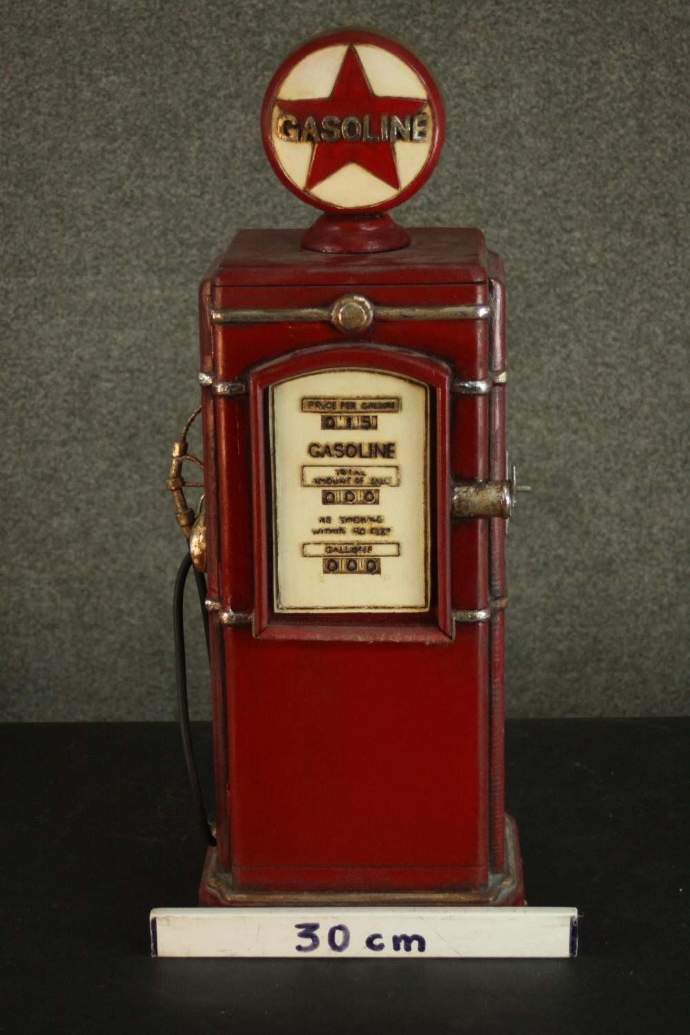 A red painted CD rack in the form of a vintage style American gasoline pump. H.66 W.22 D.19cm. - Image 2 of 10