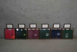 Six framed and glazed football jumpers each with its own dedication plaque. H.42 W.41cm (largest)