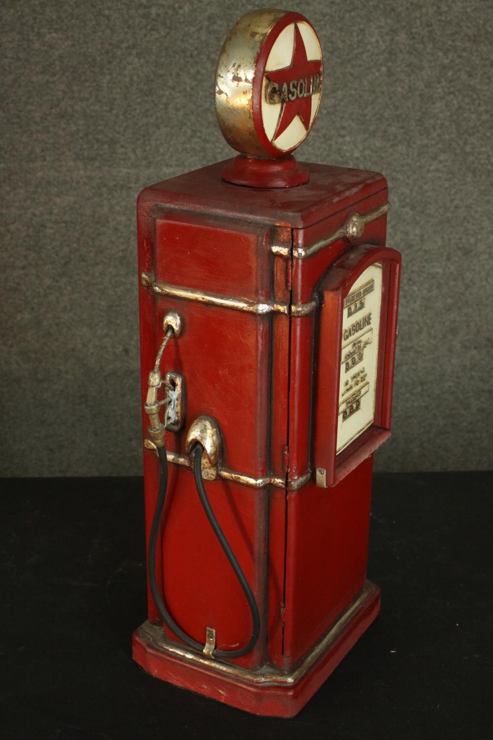 A red painted CD rack in the form of a vintage style American gasoline pump. H.66 W.22 D.19cm. - Image 8 of 10