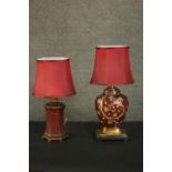 Two carved, painted and gilded Oriental vase design table lamps with red silk shades. H.62 W.27cm.
