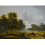 A carved gilt framed 19th century oil on canvas of a landscape with figures and cattle. Unsigned.