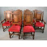 A set of ten early 20th century country antique style oak high back dining chairs, including two