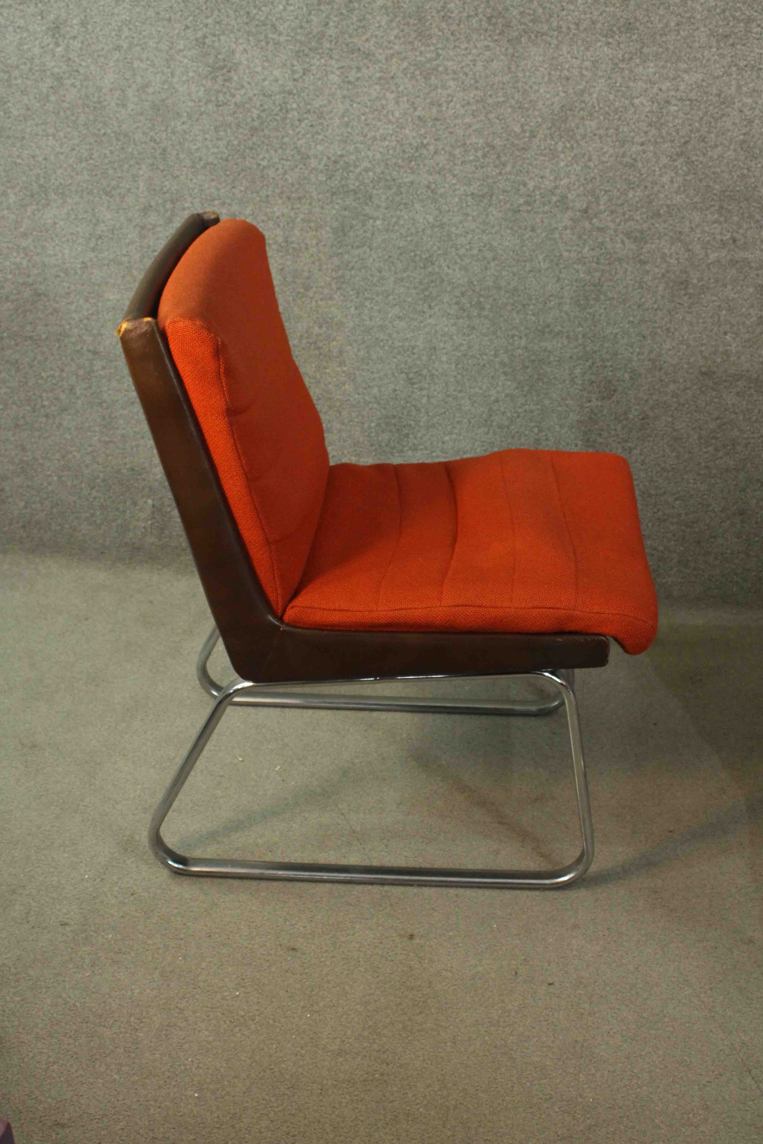 Gordon Russell for Verco, an office chair, upholstered in red fabric, with a leather frame, on - Image 4 of 7