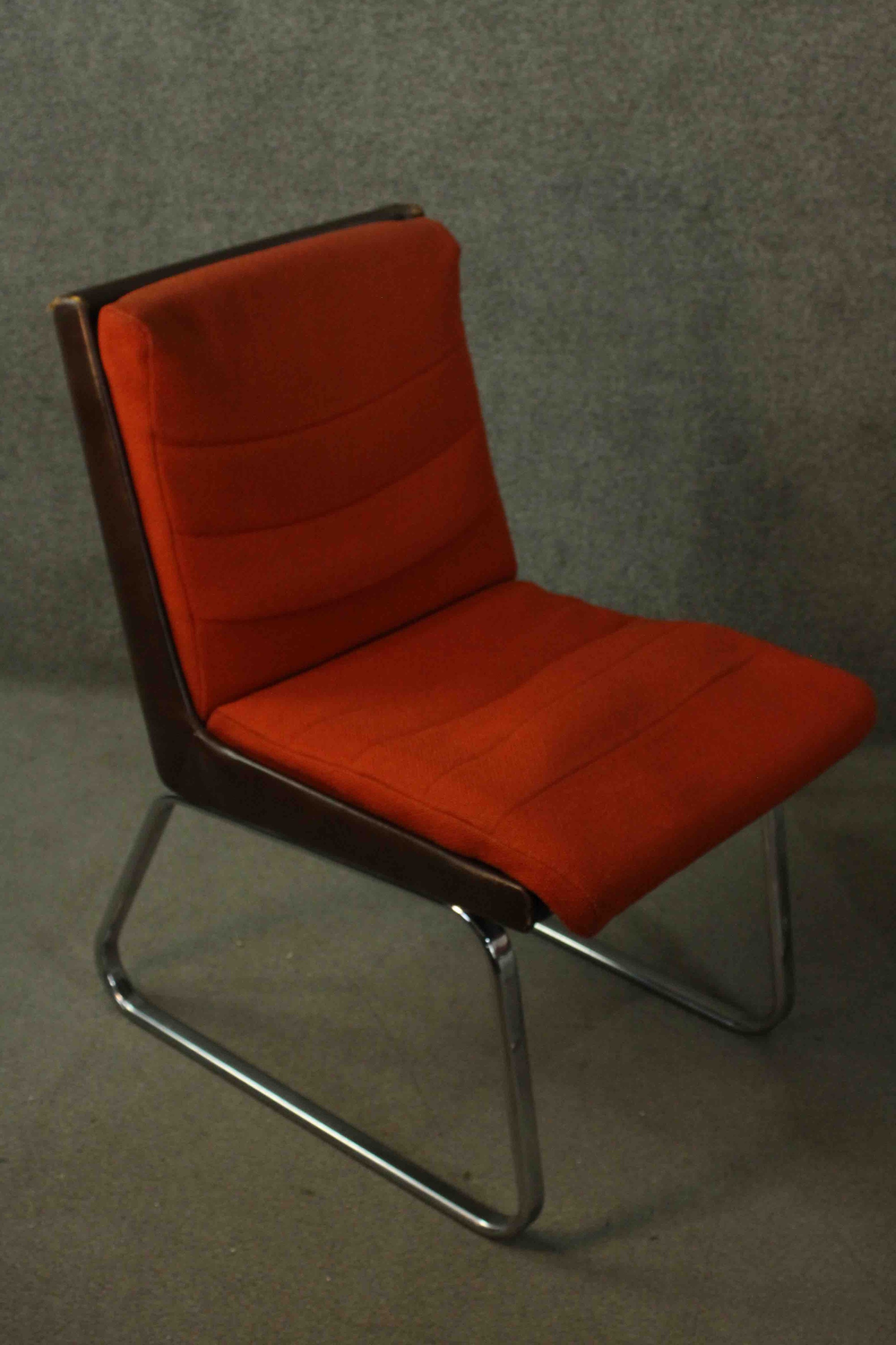 Gordon Russell for Verco, an office chair, upholstered in red fabric, with a leather frame, on - Image 2 of 7