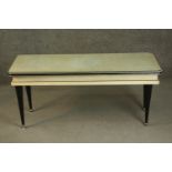 Attributed to Umberto Mascagni, a 1950s Italian vinyl clad coffee table, of rectangular form, on