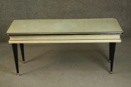 Attributed to Umberto Mascagni, a 1950s Italian vinyl clad coffee table, of rectangular form, on