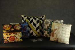 A collection of six contemporary cushions.